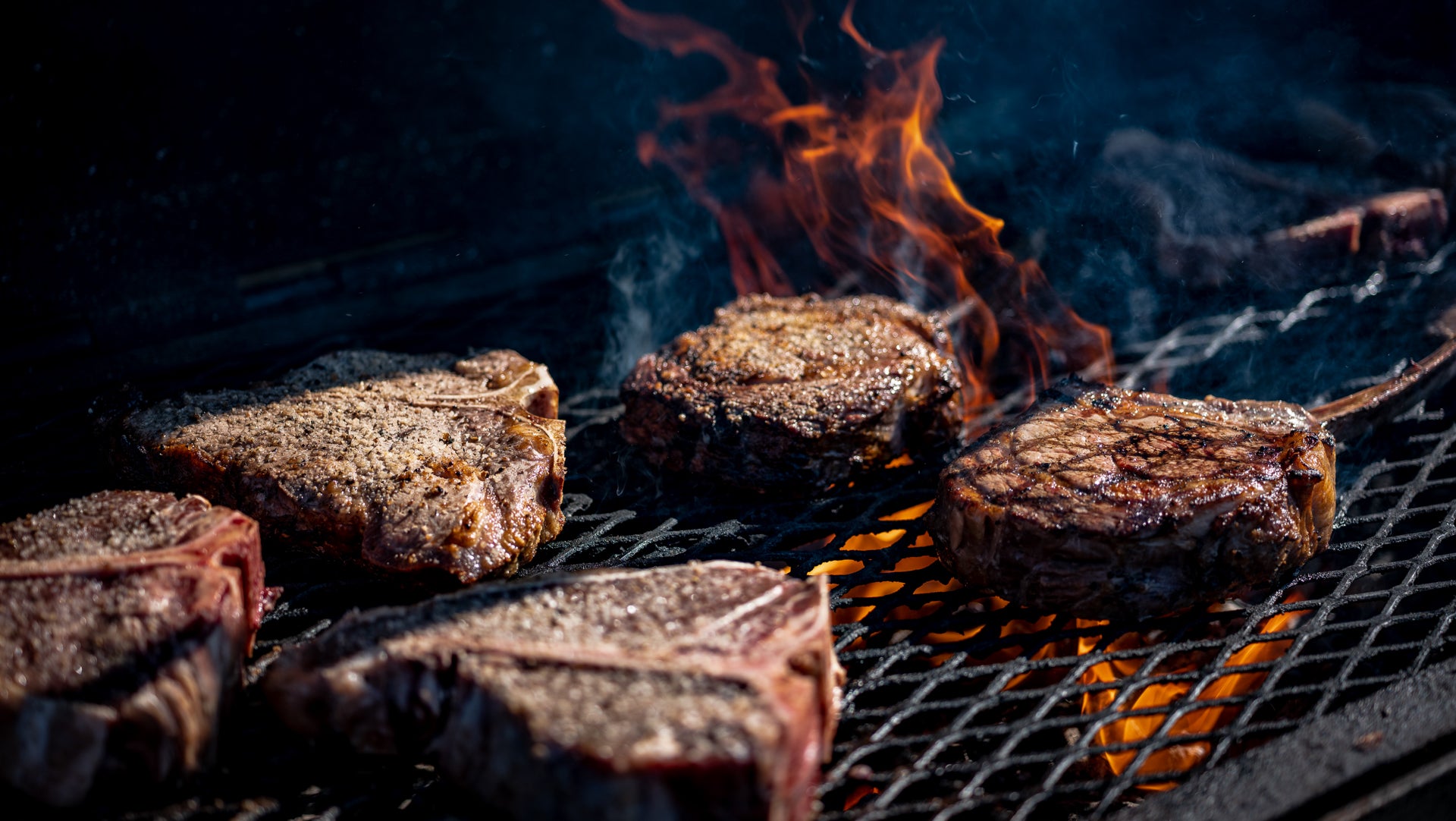 44 farms steaks cooked on open flame grill